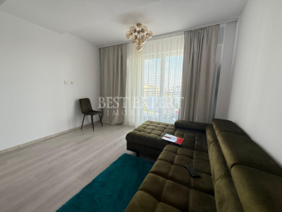 2 Camere de inchiriat  complet mobilat si cu Parcare acoperita 